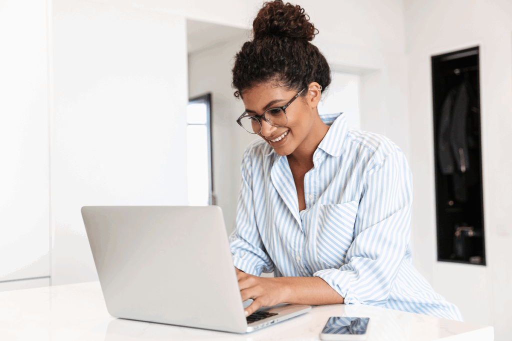 woman using a laptop during work